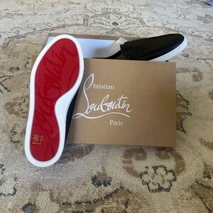 Christian Louboutin Black Loafers with Red Sole